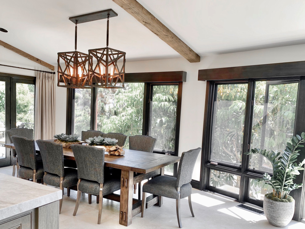 Great room - mediterranean limestone floor and beige floor great room idea with white walls