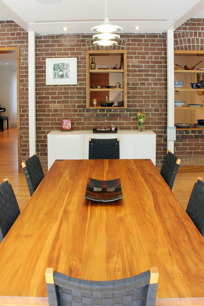Idee per una sala da pranzo aperta verso la cucina minimal di medie dimensioni