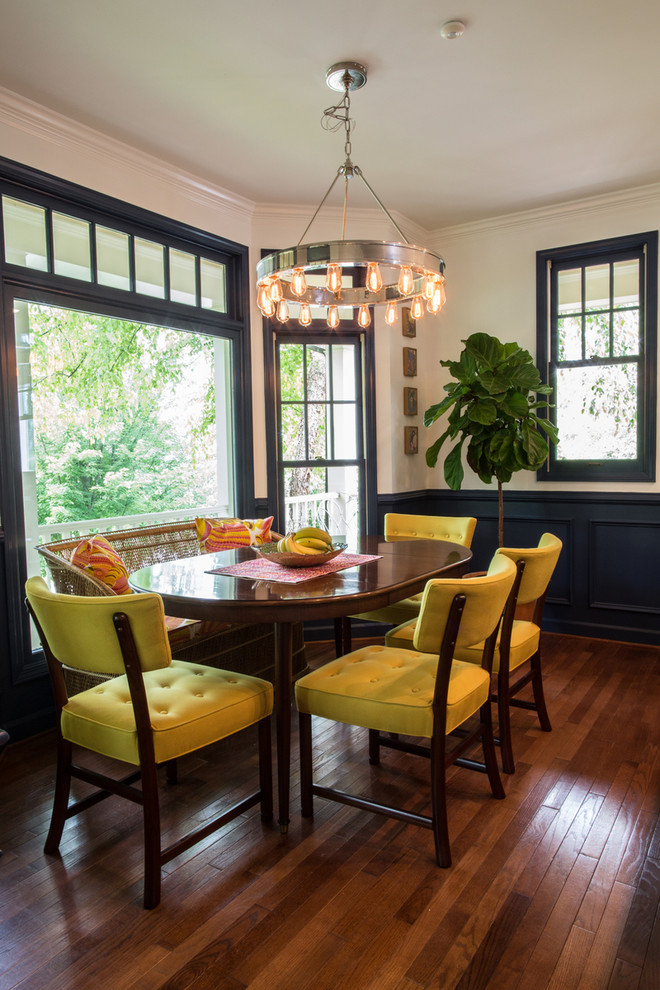 Example of a transitional dining room design in Other with white walls