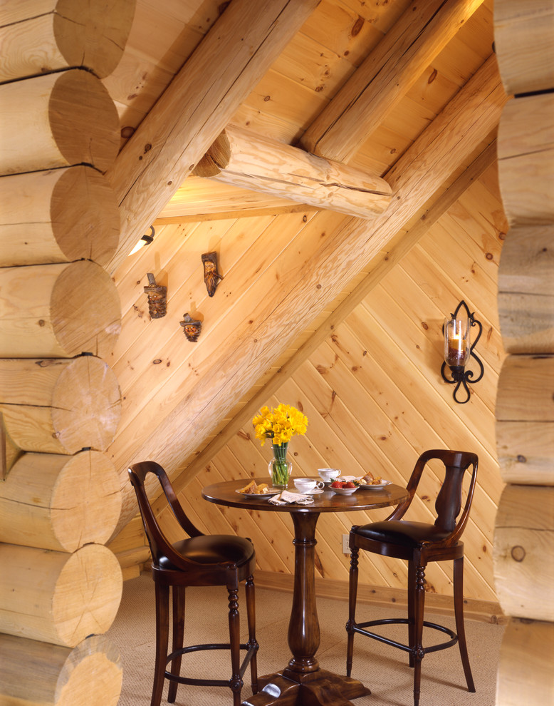 This is an example of a rustic dining room in Cleveland.