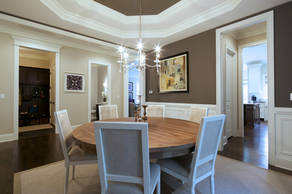 Medium sized coastal enclosed dining room in Chicago with brown walls, dark hardwood flooring and no fireplace.