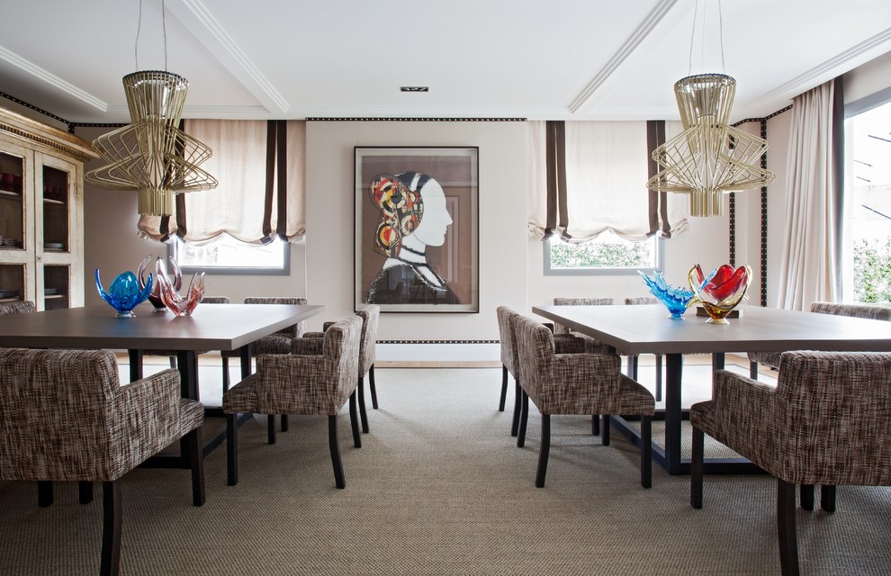 Inspiration for a large contemporary enclosed dining room in Madrid with beige walls, carpet and no fireplace.