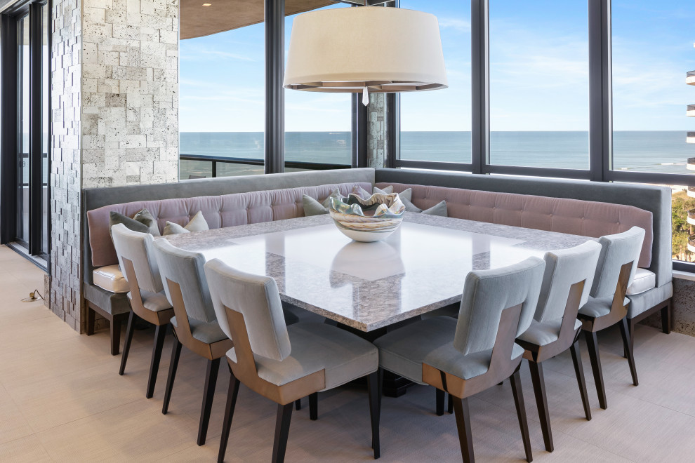 Idee per una sala da pranzo aperta verso il soggiorno contemporanea con pavimento grigio