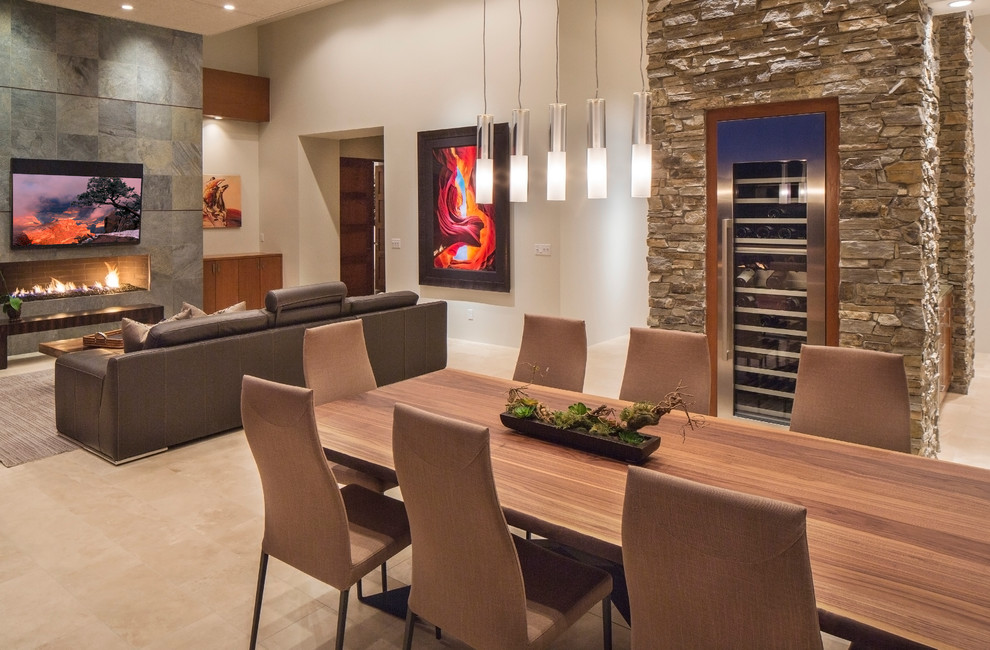 Photo of a contemporary open plan dining room in Phoenix with white walls.