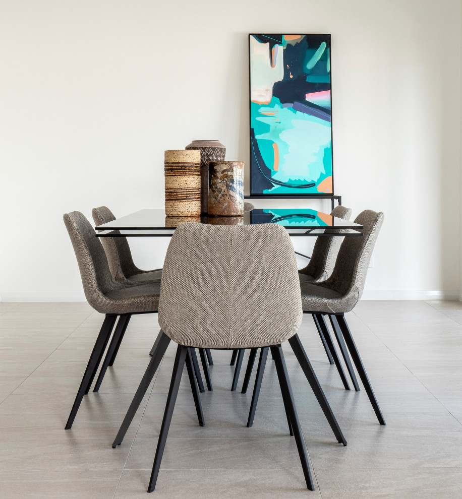 Photo of a medium sized modern open plan dining room in Perth with white walls, porcelain flooring and grey floors.