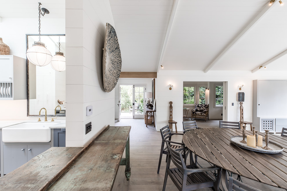 Design ideas for a large beach style open plan dining room in Santa Barbara.