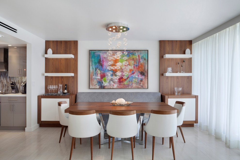 Idee per una sala da pranzo aperta verso la cucina minimal con pareti bianche e pavimento in gres porcellanato