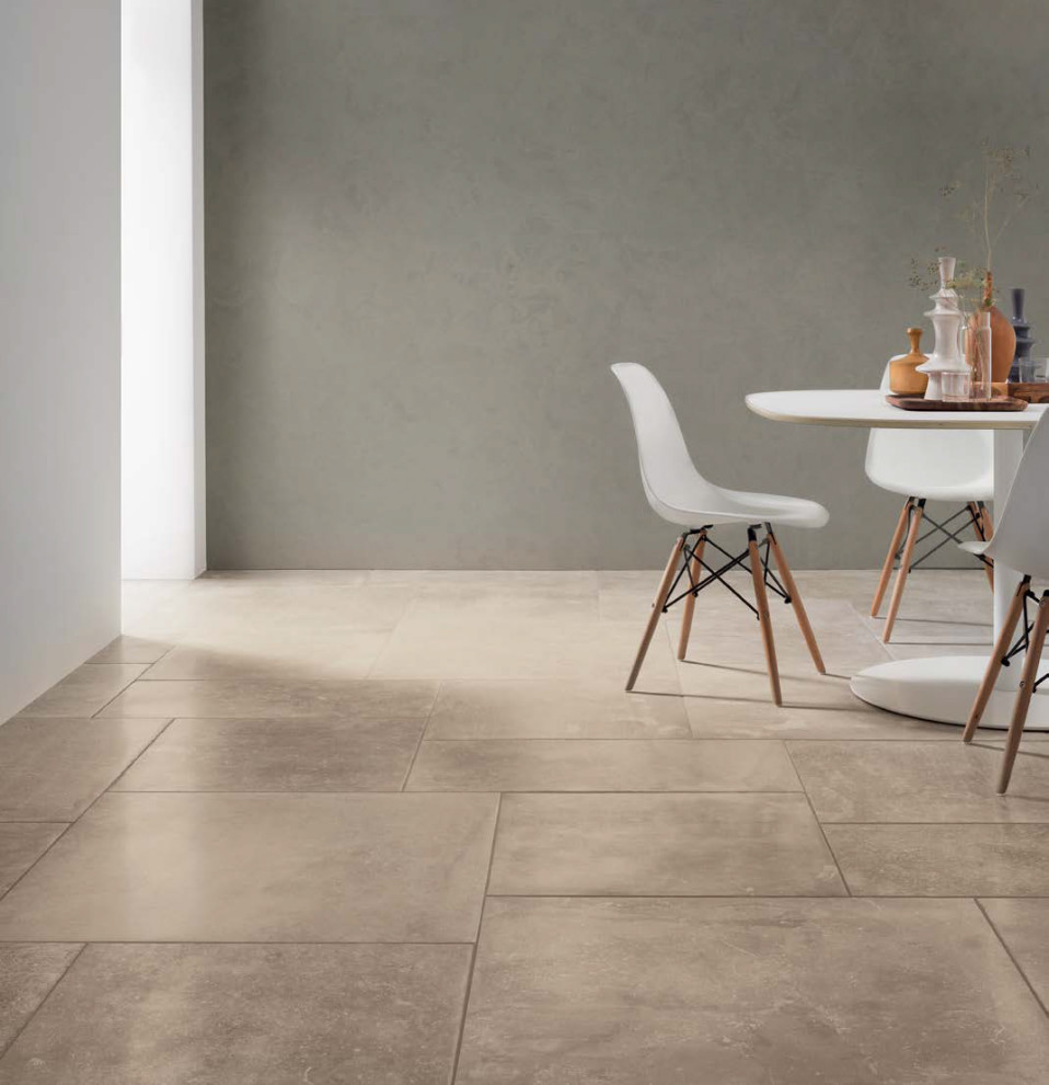 Contemporary dining area with beige stone look porcelain tile Contemporary Dining Room
