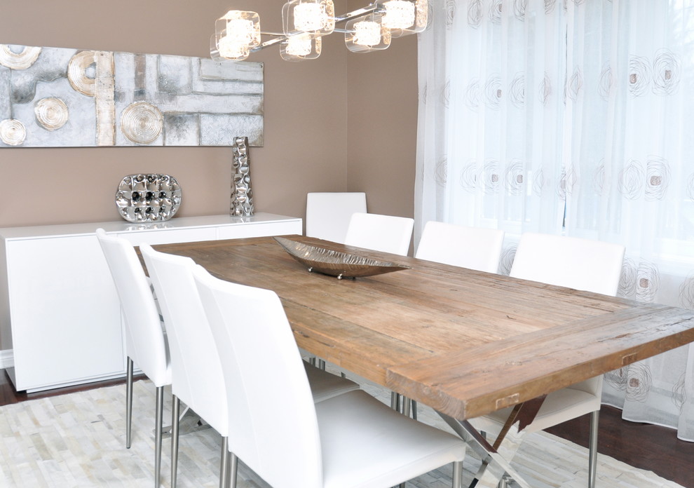 Enclosed dining room - mid-sized contemporary dark wood floor and brown floor enclosed dining room idea in Montreal with beige walls and no fireplace