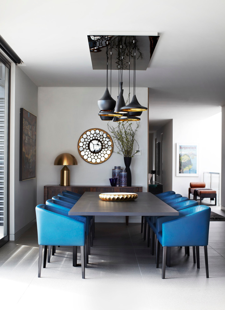 Inspiration for a contemporary dining room remodel in Melbourne with white walls