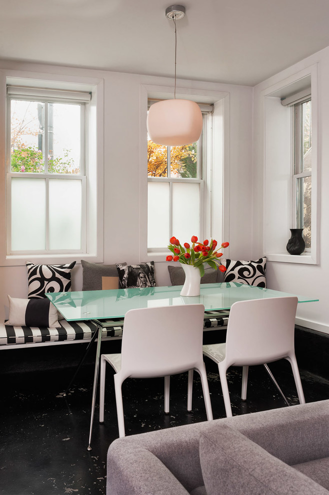 Idee per una sala da pranzo aperta verso il soggiorno minimal con pareti bianche