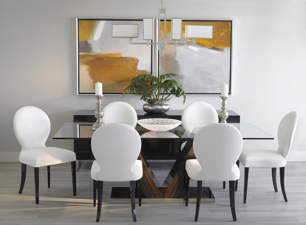 Photo of a medium sized contemporary enclosed dining room in Miami with white walls, light hardwood flooring and no fireplace.