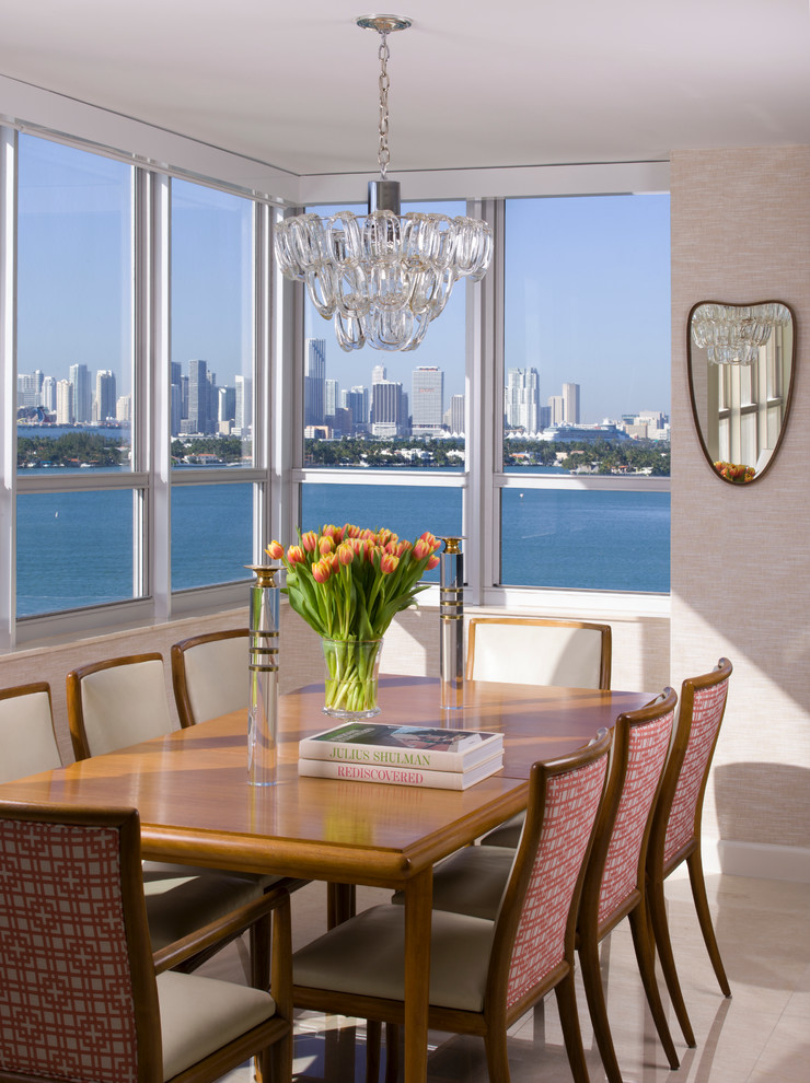 Contemporary dining room in New York with beige walls.