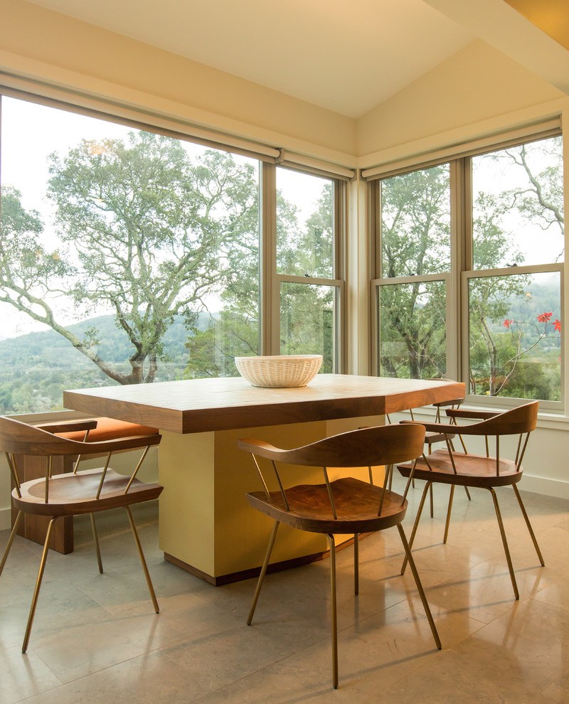 Photo of a medium sized contemporary enclosed dining room in San Francisco with beige walls, ceramic flooring and no fireplace.