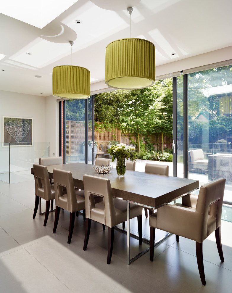 Inspiration for a contemporary dining room in Cheshire with white walls.