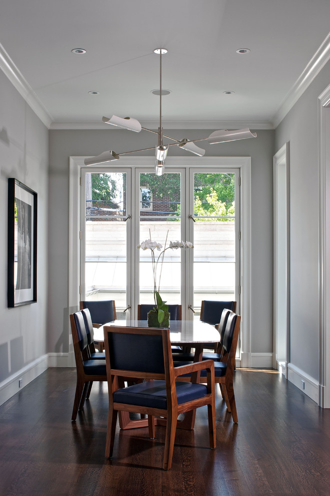 Inspiration for a contemporary dining room in Chicago with grey walls.