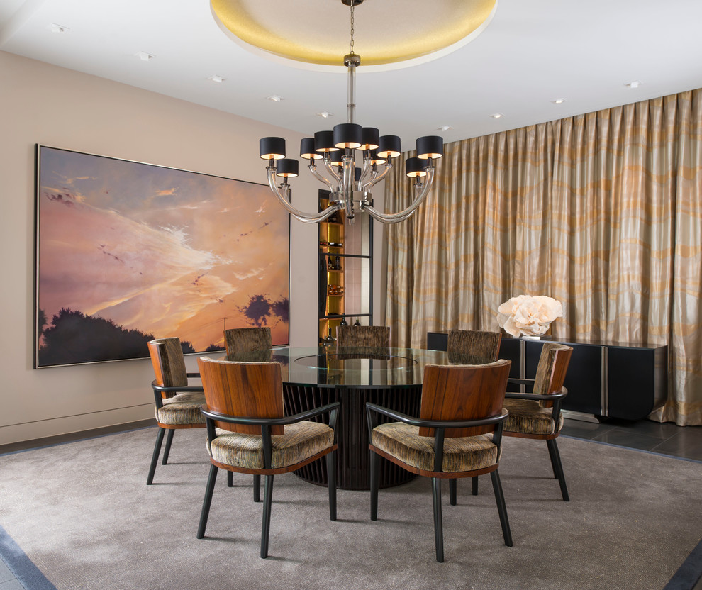 This is an example of a contemporary dining room in Dallas with beige walls.