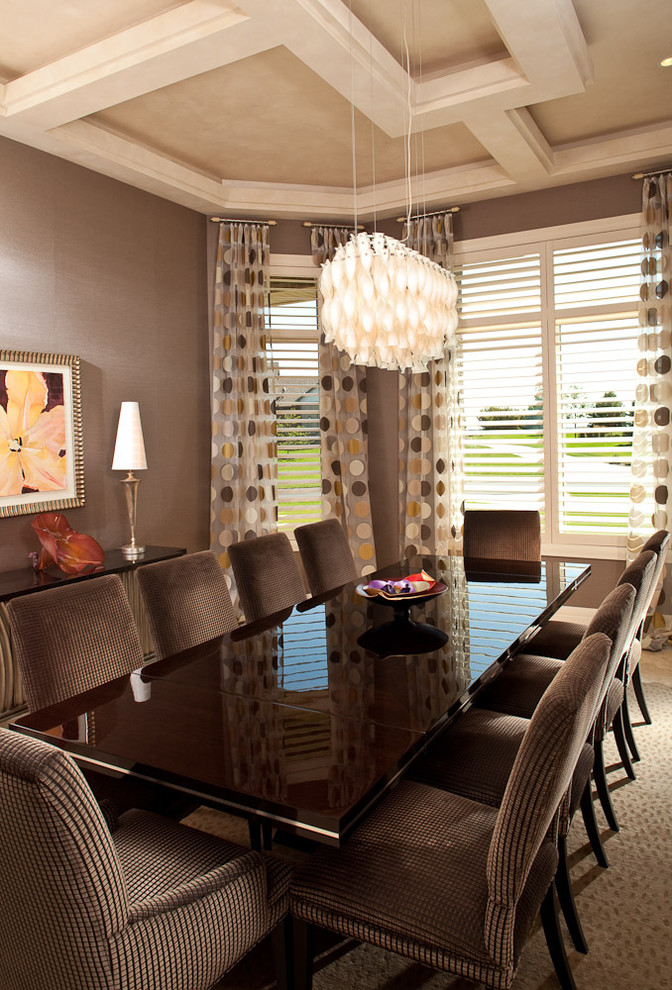 This is an example of a contemporary dining room in Minneapolis with brown walls.