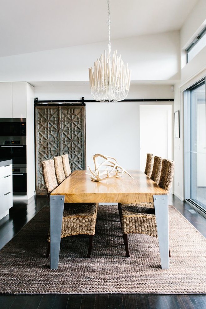 This is an example of a medium sized contemporary kitchen/dining room in Melbourne with white walls, dark hardwood flooring, no fireplace and brown floors.