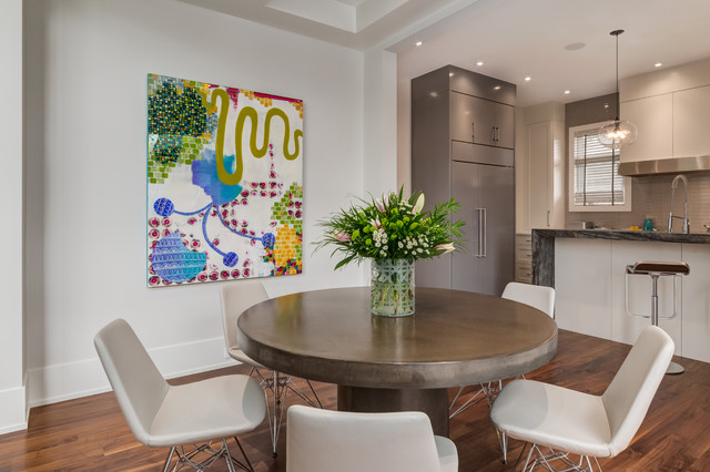 Contemporary Dining Room with Two Way Fireplace and Custom Stair