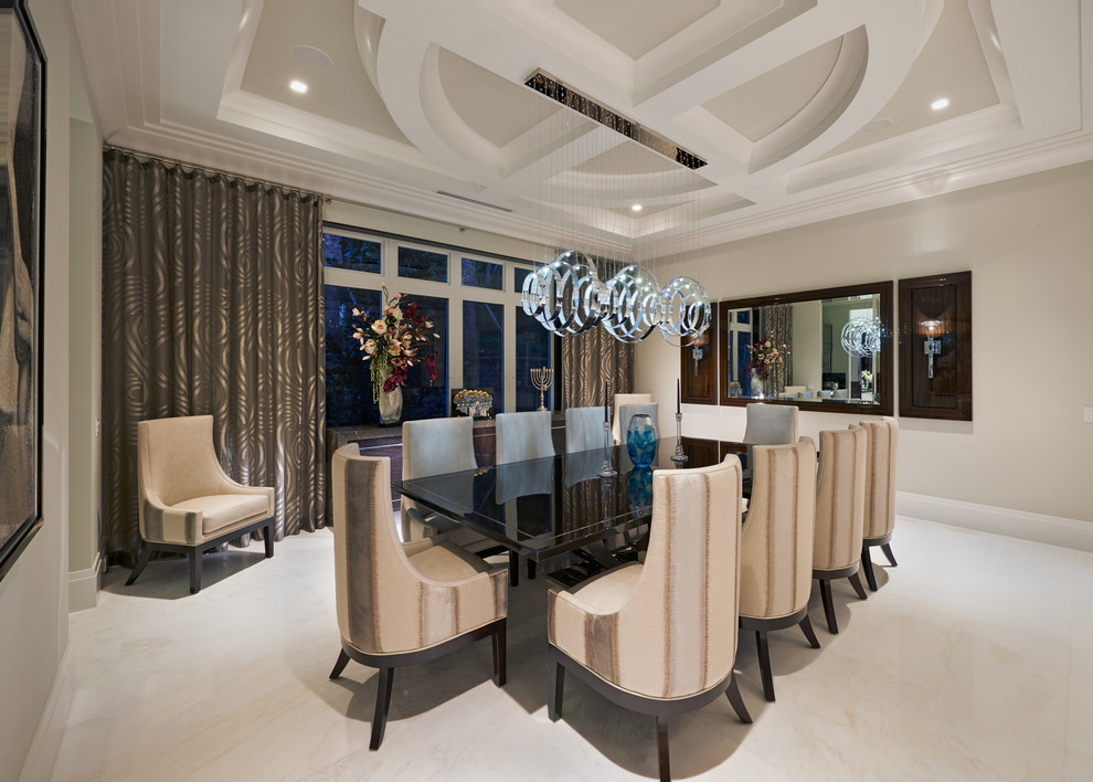 Photo of an expansive contemporary open plan dining room in Miami with beige walls, marble flooring and no fireplace.