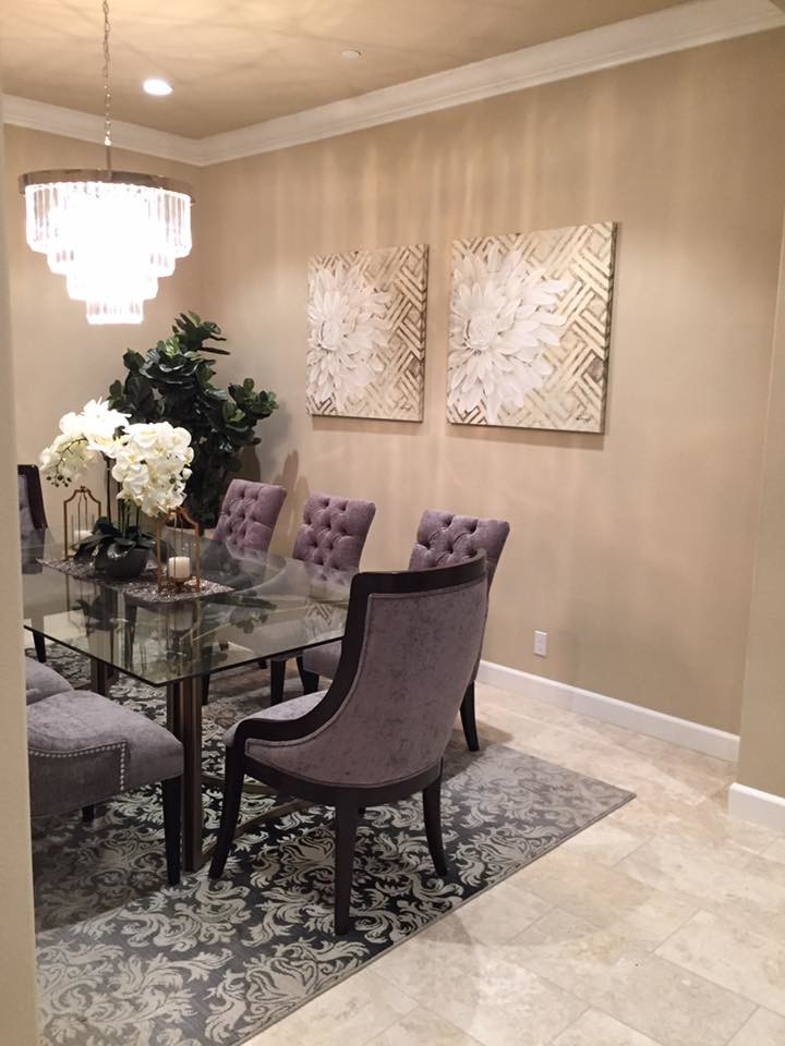 This is an example of a medium sized contemporary enclosed dining room in Orange County with beige walls, travertine flooring and white floors.