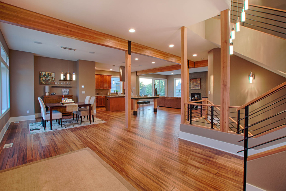 Kitchen/dining room combo - huge contemporary bamboo floor kitchen/dining room combo idea in Seattle with beige walls