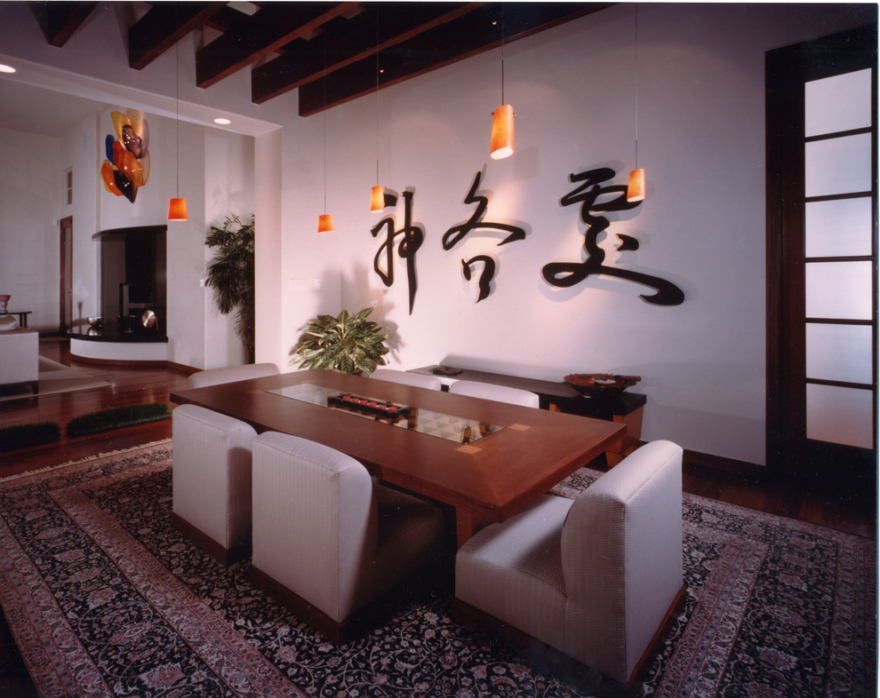Great room - large zen medium tone wood floor great room idea in Denver with white walls