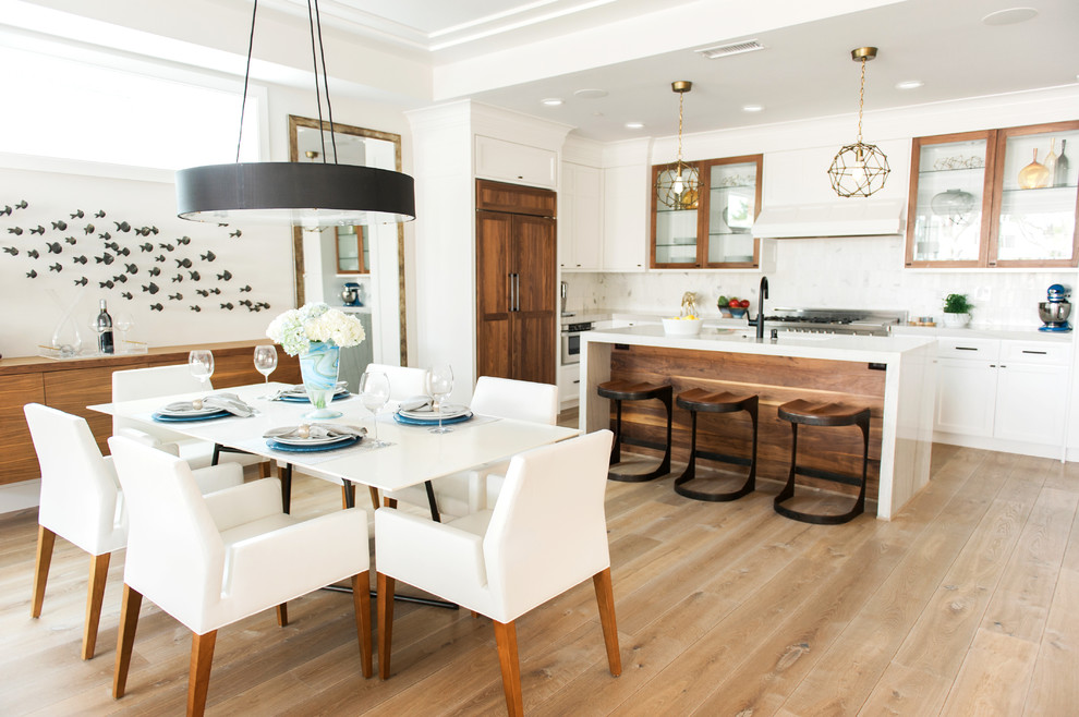 Inspiration for a contemporary light wood floor great room remodel in Orange County