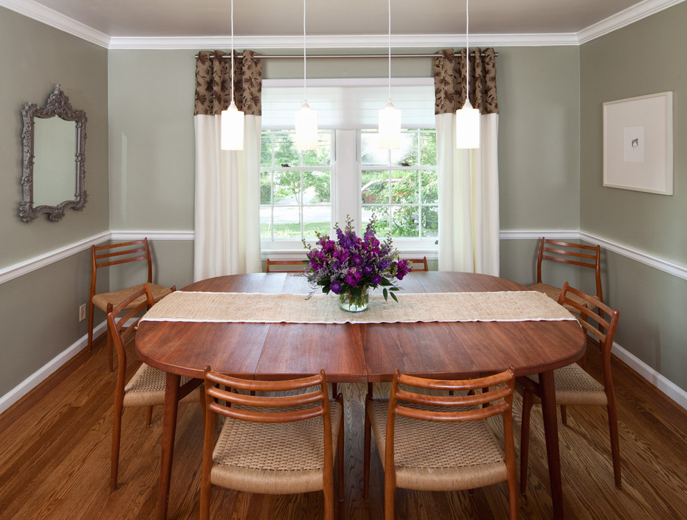 This is an example of a contemporary dining room in Cincinnati with grey walls.
