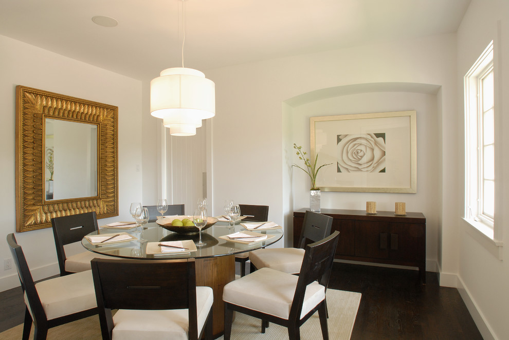 Inspiration for a mid-sized contemporary dark wood floor enclosed dining room remodel in Los Angeles with white walls