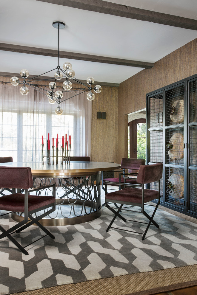 Photo of an eclectic enclosed dining room in Los Angeles with beige walls.