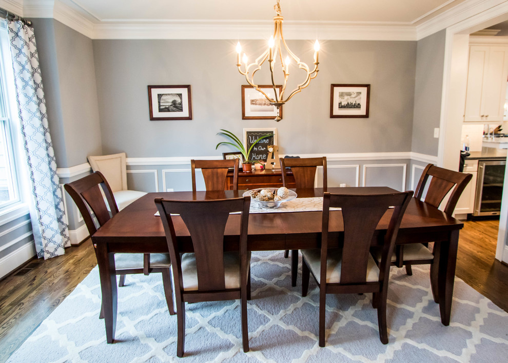 Inspiration for a medium sized classic enclosed dining room in Philadelphia with blue walls, dark hardwood flooring and no fireplace.