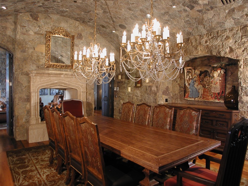 Photo of a classic dining room in Denver with a two-sided fireplace.