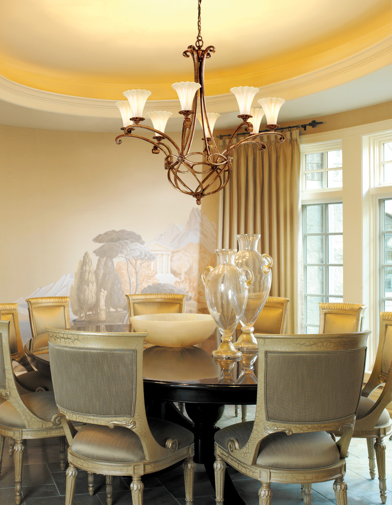 This is an example of a traditional dining room in Miami with beige walls.