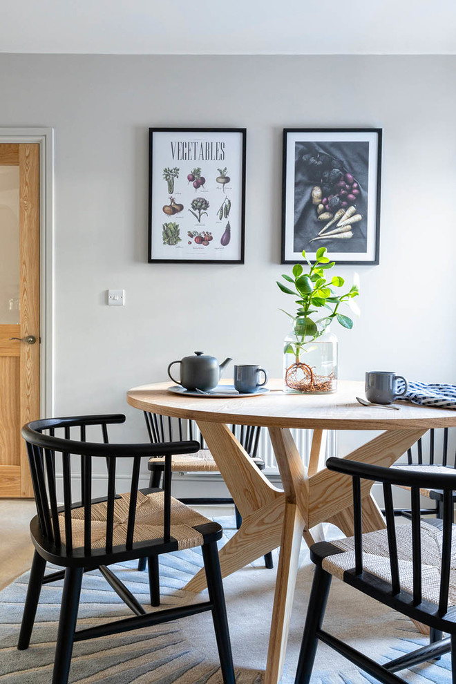 Small danish kitchen/dining room combo photo in Hertfordshire with gray walls