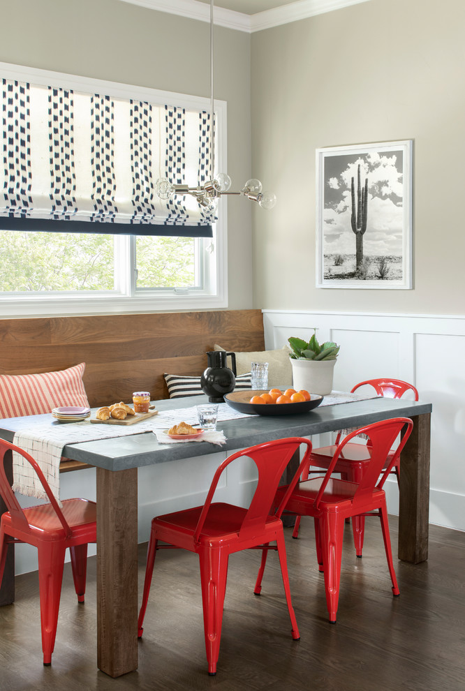 Inspiration for a country dark wood floor and brown floor dining room remodel in Denver with beige walls