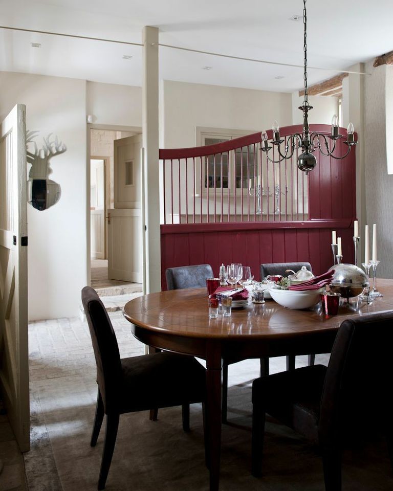 Mid-sized country enclosed dining room photo in London with beige walls and no fireplace