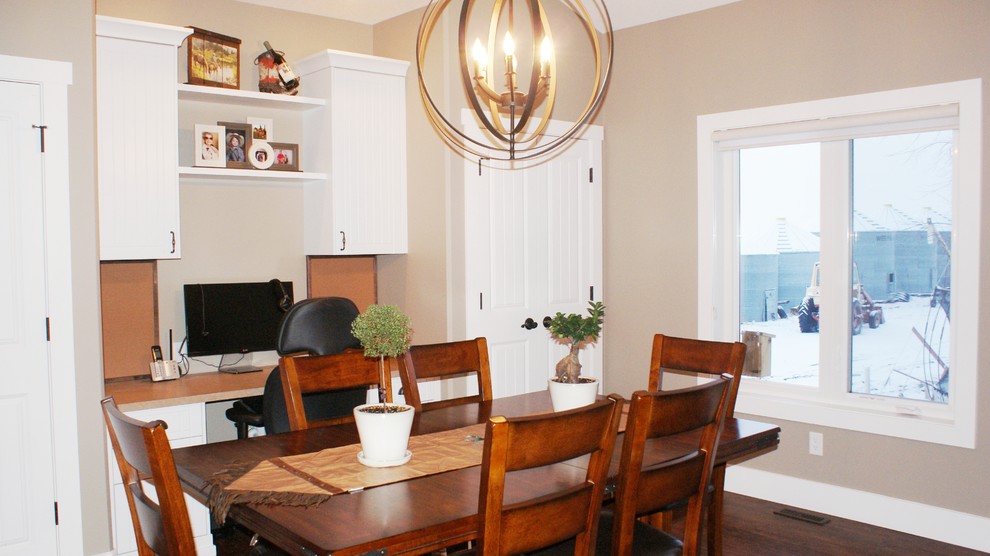 Inspiration for a medium sized rural open plan dining room in Calgary with beige walls and medium hardwood flooring.