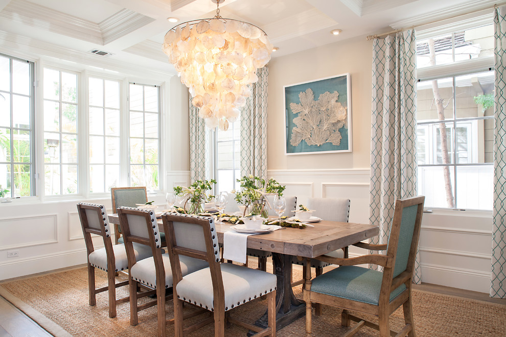 Inspiration for a medium sized coastal enclosed dining room in Orange County with beige walls, medium hardwood flooring and no fireplace.