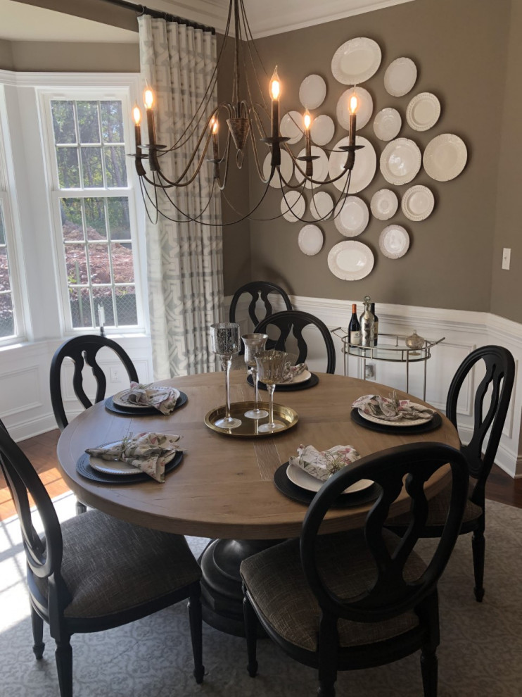 Inspiration for a mid-sized french country dark wood floor and brown floor kitchen/dining room combo remodel in Philadelphia with brown walls and no fireplace