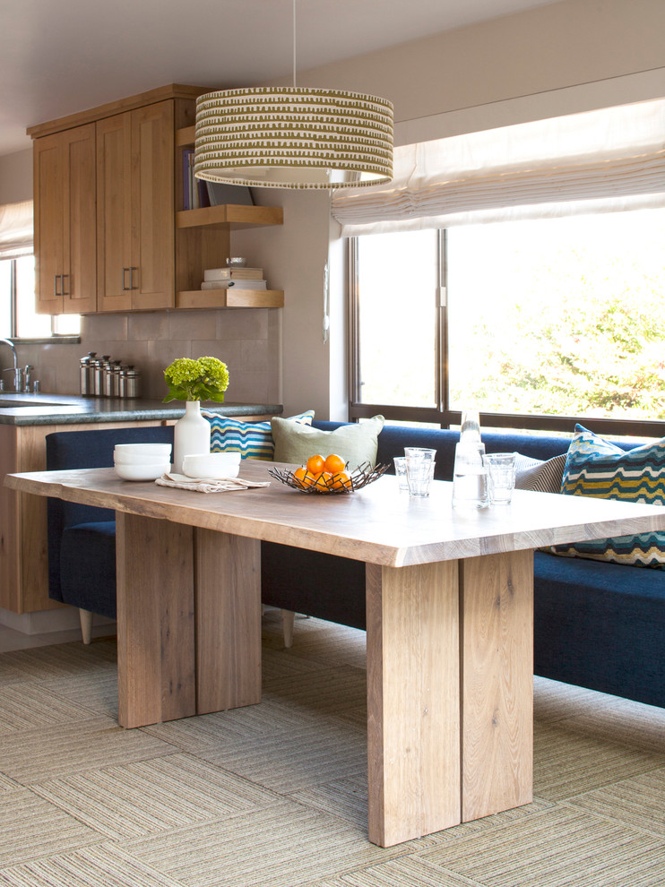 Kitchen/dining room combo - small contemporary carpeted kitchen/dining room combo idea in San Francisco with beige walls