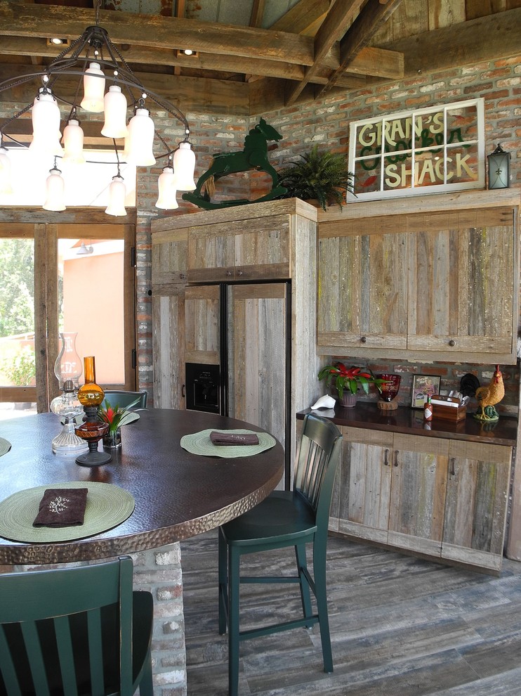 Design ideas for a rustic dining room in Jacksonville.