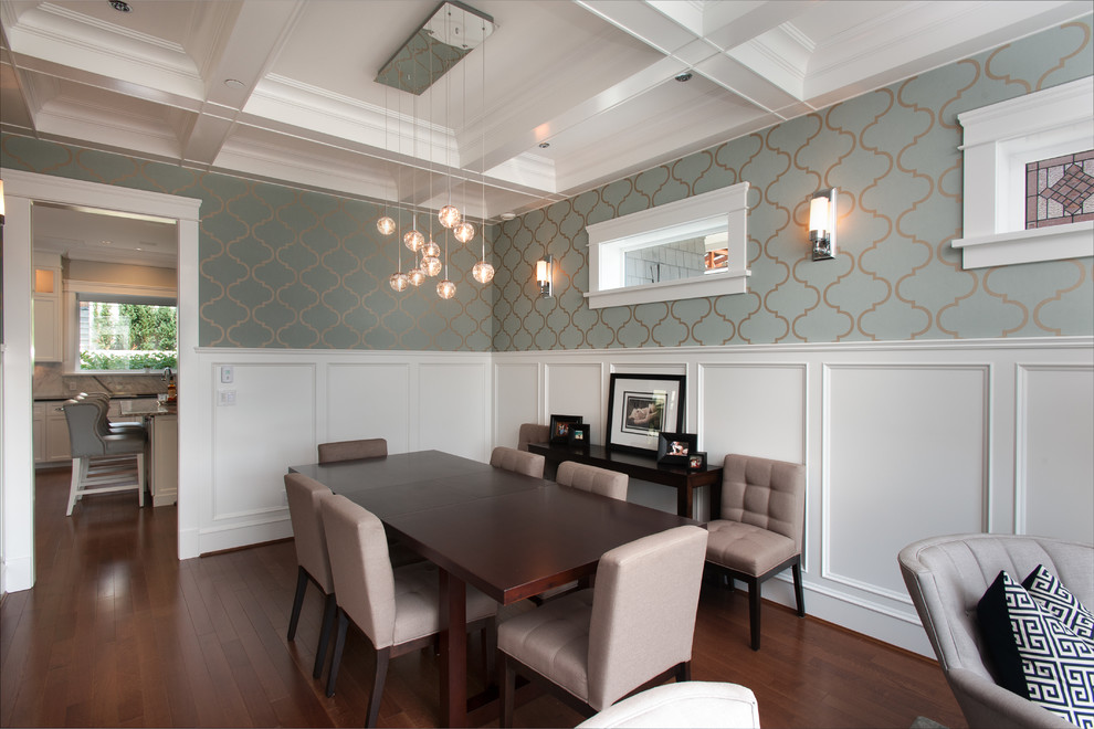 Enclosed dining room - large craftsman medium tone wood floor enclosed dining room idea in Vancouver with gray walls