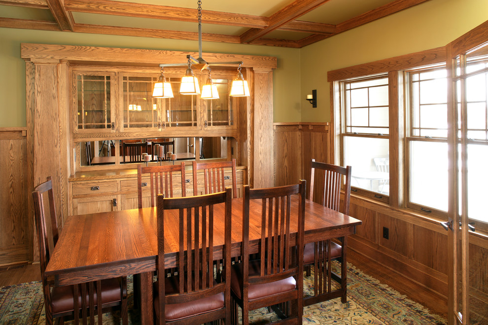 Example of an arts and crafts dining room design in Minneapolis