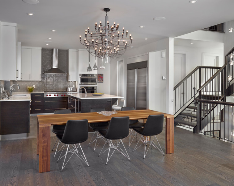 Example of a large trendy light wood floor kitchen/dining room combo design in Edmonton with white walls
