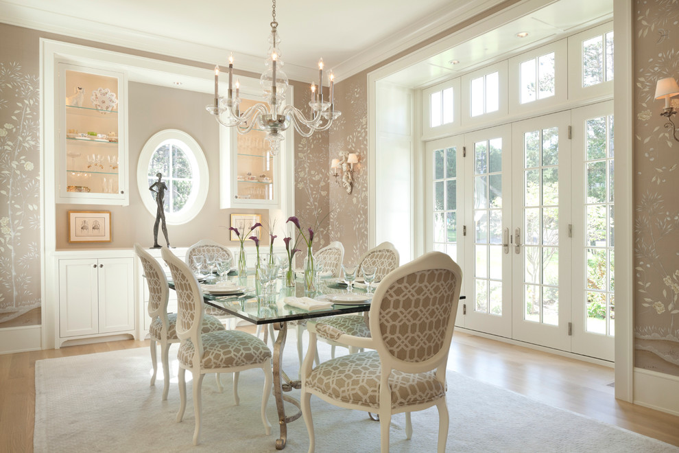 Design ideas for a classic dining room in Minneapolis with beige walls, light hardwood flooring and no fireplace.