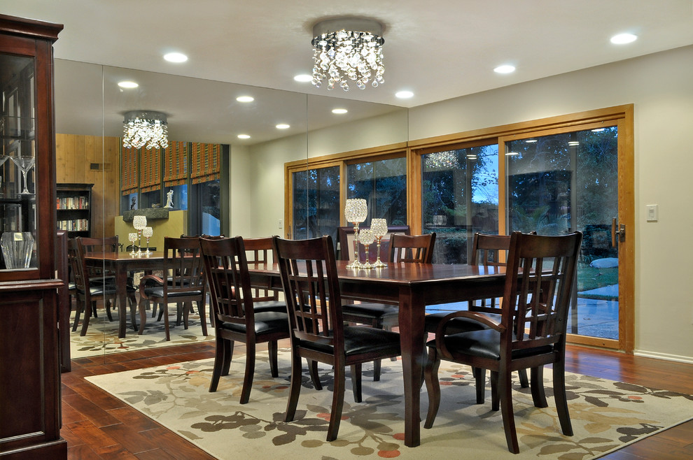 Traditional dining room in New York with medium hardwood flooring and no fireplace.
