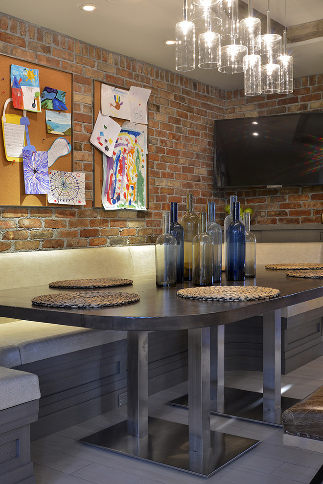 Photo of a large modern kitchen/dining room in New York with multi-coloured walls, light hardwood flooring and no fireplace.