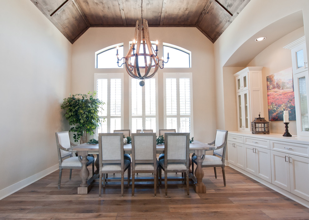 Elegant light wood floor dining room photo in Austin